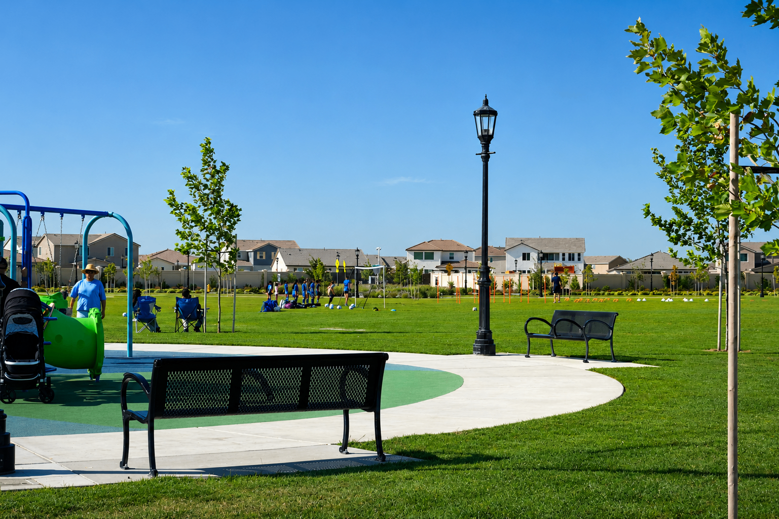 Community park with open lawn and playground