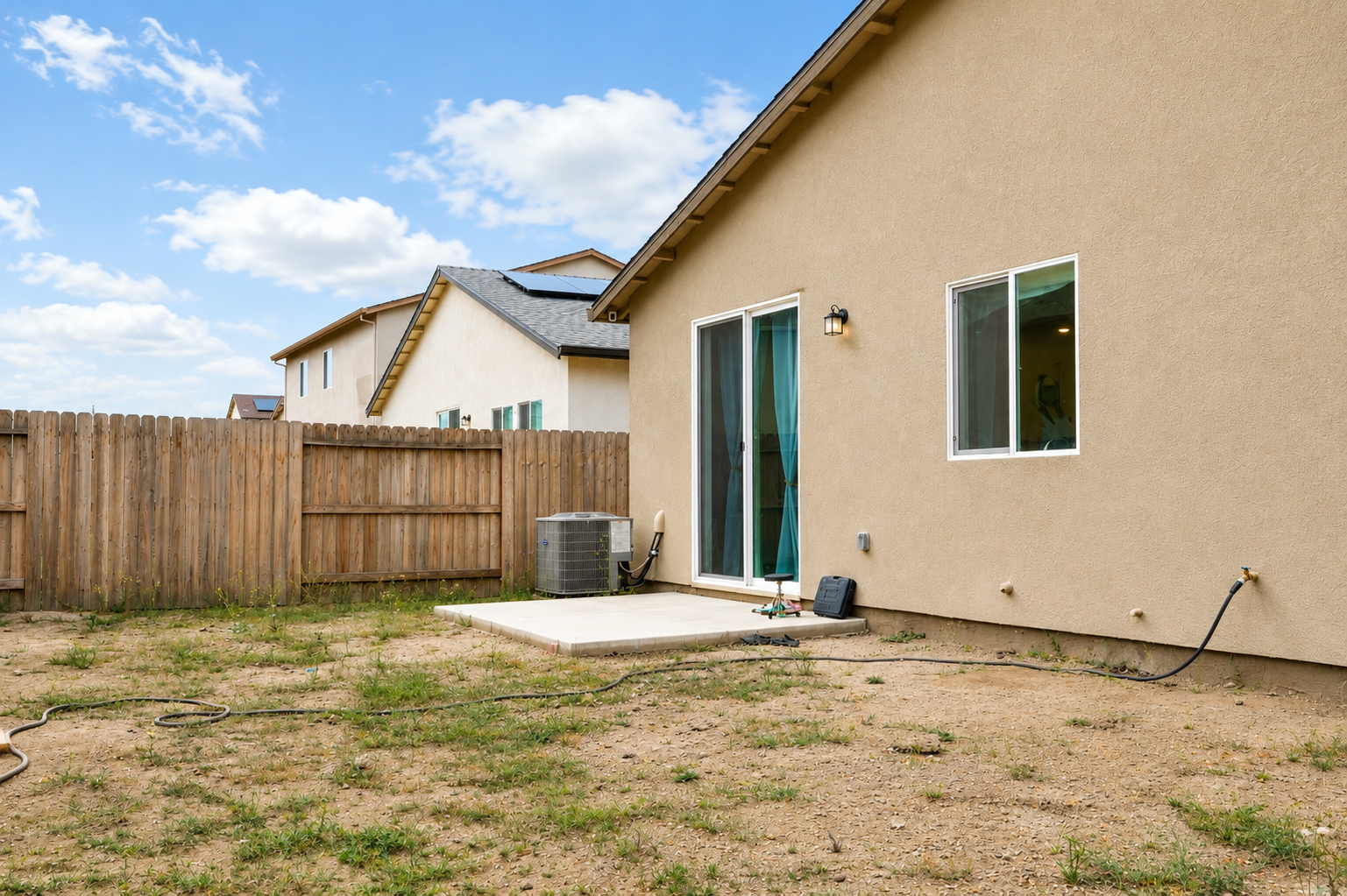 Blank-canvas backyard ready for your vision